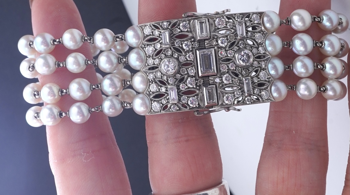 A cultured pearl and diamond bracelet